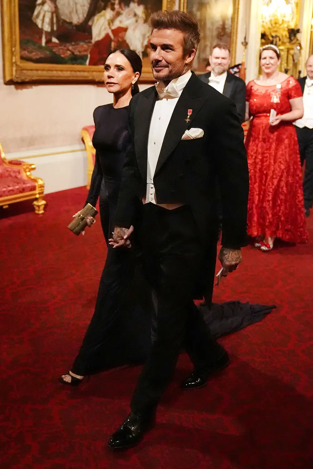 Victoria and David Beckham Hold Hands During Event at Buckingham Palace 2