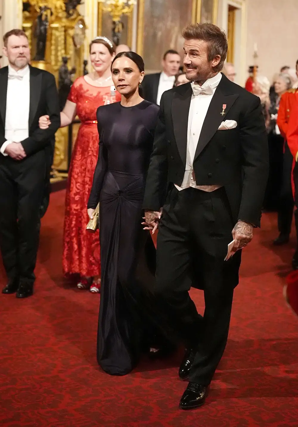 Victoria and David Beckham Hold Hands During Event at Buckingham Palace 3