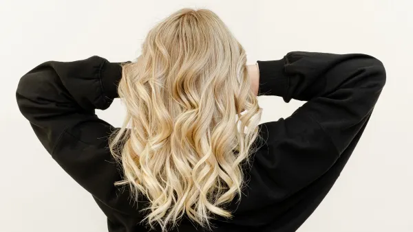 Modern trendy Air Touch Ombre technique for hair dyeing. Look from behind