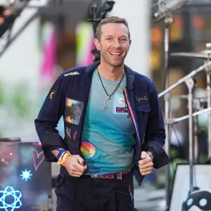 NEW YORK, NEW YORK - OCTOBER 08: Chris Martin of Coldplay performs on NBC's "Today" at Rockefeller Plaza on October 08, 2024 in New York City. (Photo by John Nacion/FilmMagic)