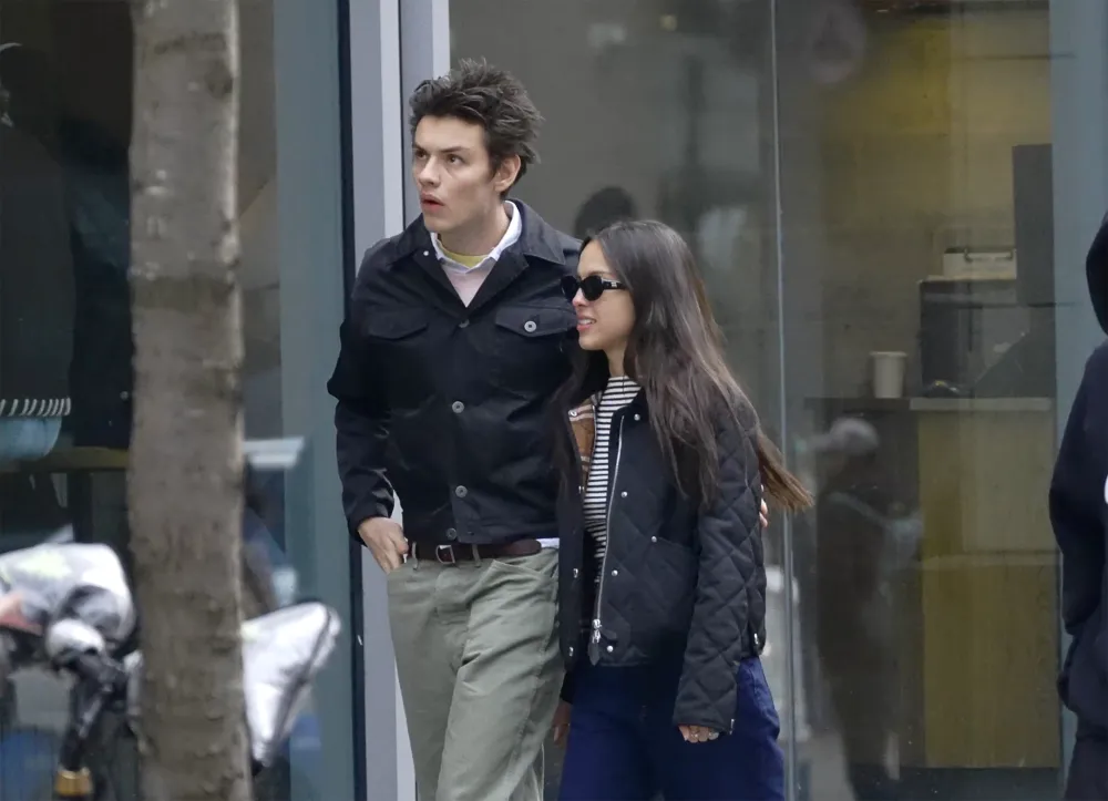 Olivia Rodrigo Sweetly Cuddles Up to Boyfriend Louis Partridge on Winter New York City Date