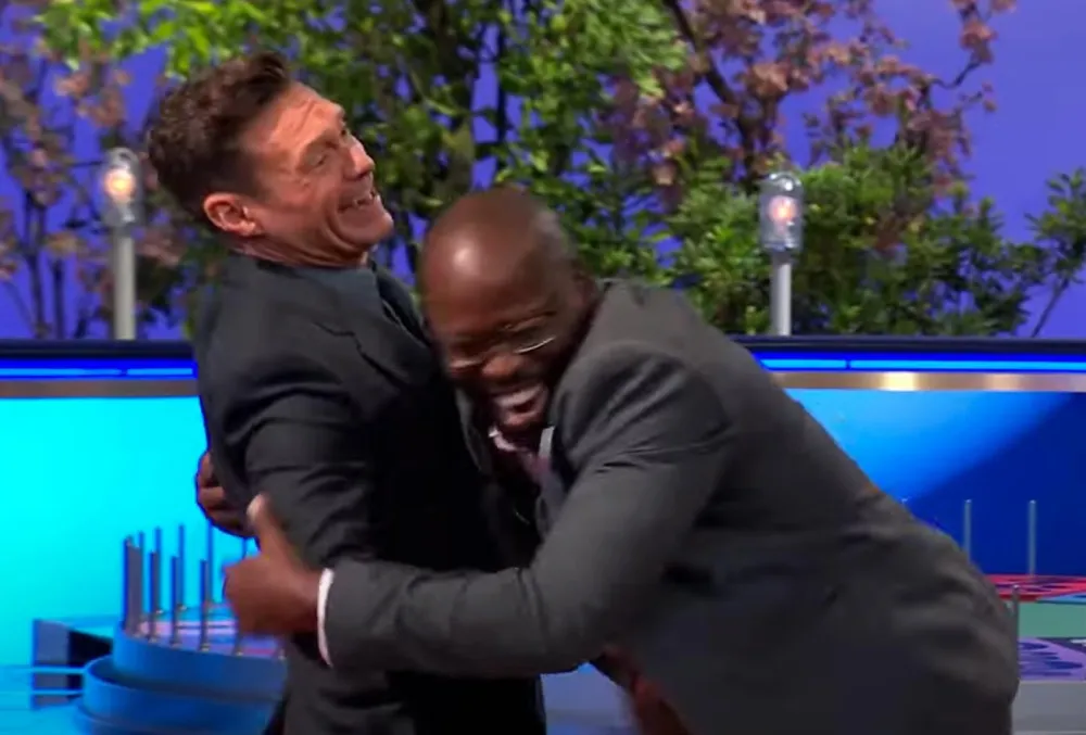 Wheel of Fortune Ryan Seacrest Is Startled as Player Grabs Him 683