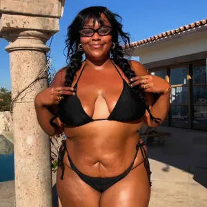 Lizzo Rings in 2025 With Skimpy Bikini Snap