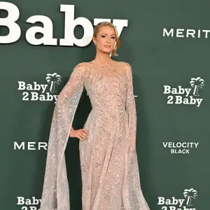 Paris Hilton Documents Emotional Visit to Burned Down L.A. Replica Luxury Handbag