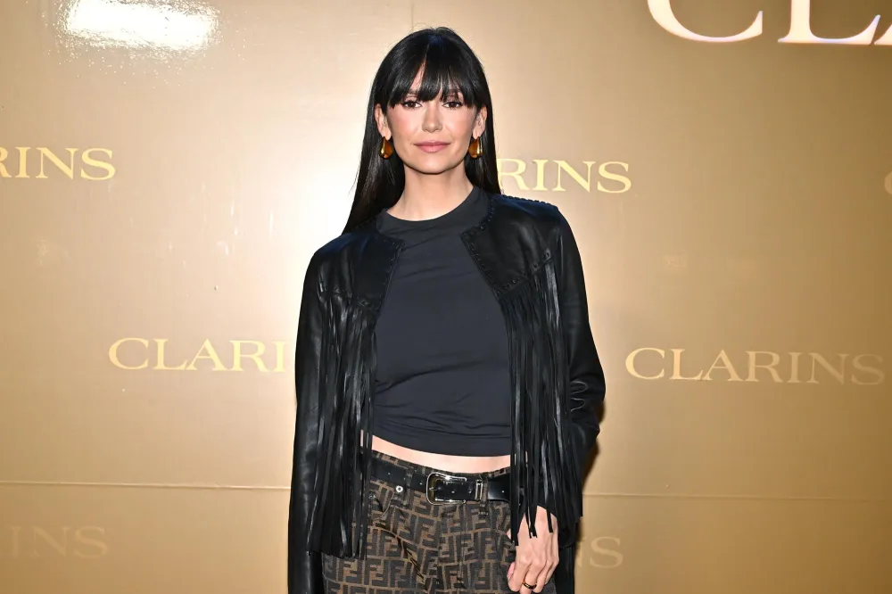 Nina Dobrev Cuts Her Own Bangs