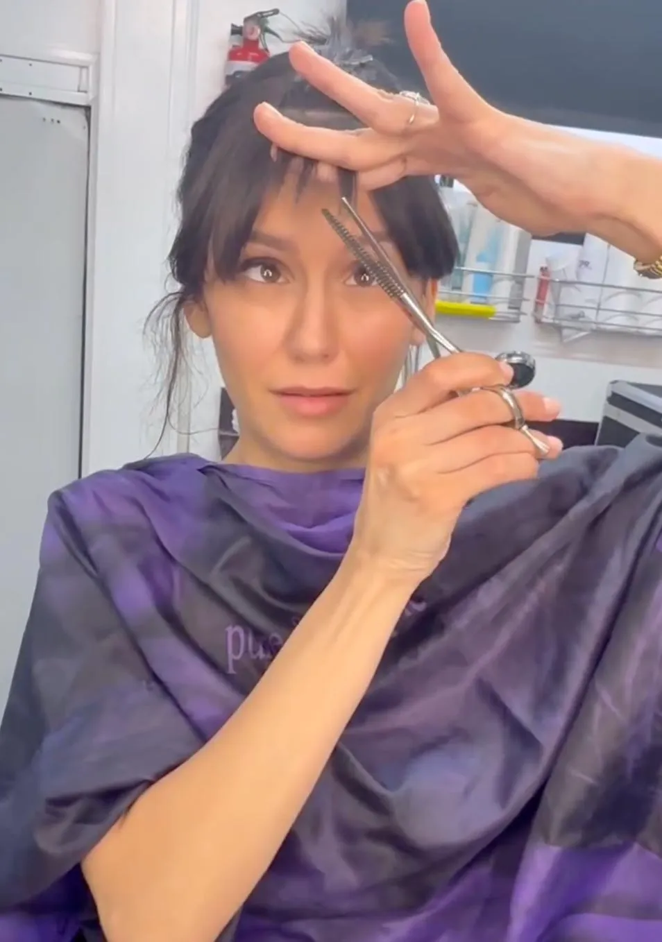 Nina Dobrev Cuts Her Own Bangs