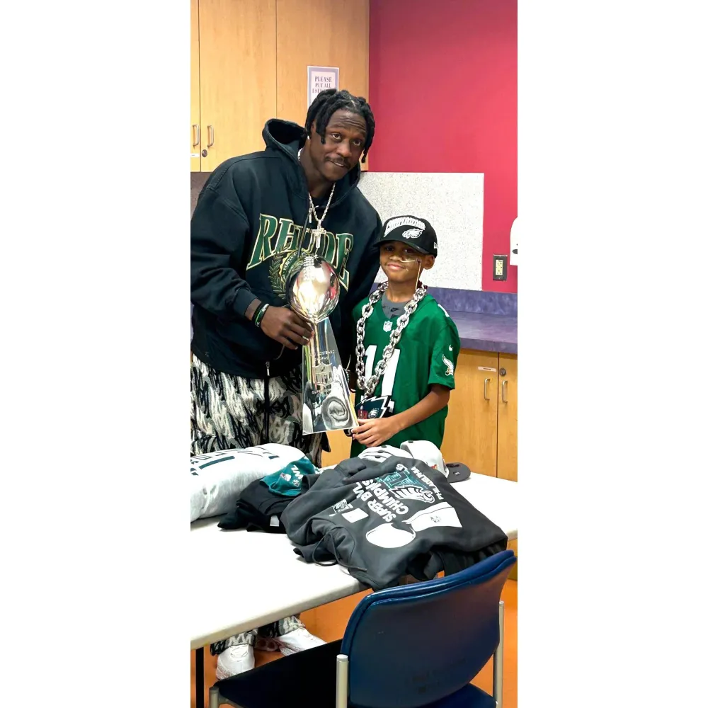 Eagles AJ Brown Visits 10 Year Old Who Protected Sister From Philadelphia Plane Crash Debris