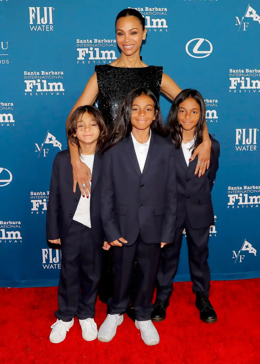 Feature Zoe Saldana Makes Rare Red Carpet Appearance With 3 Lookalike Sons