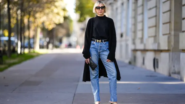 Emy Venturini in black cardigan and jeans