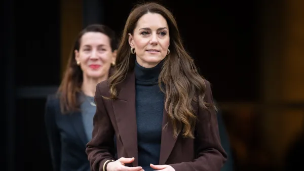 kate middleton wearing brown blazer and gray sweater