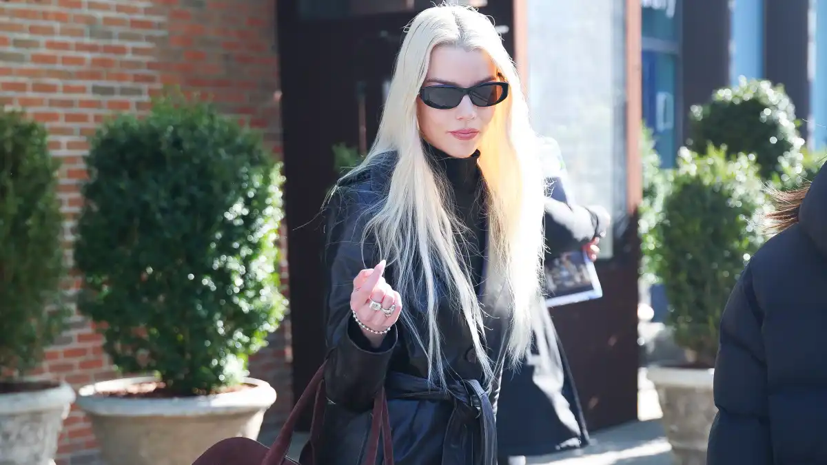 Anya Taylor-Joy in brown coat