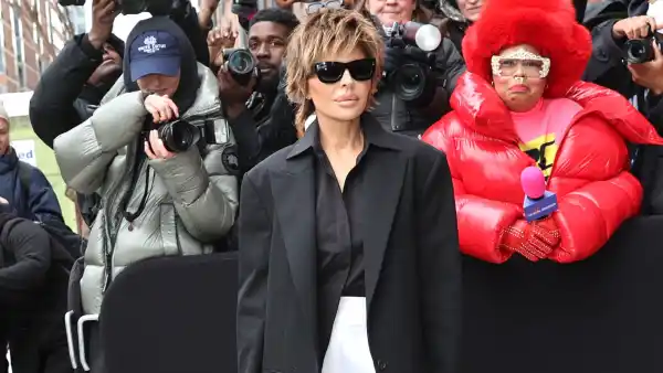 lisa rinna in black blazer and white pants and nyfw