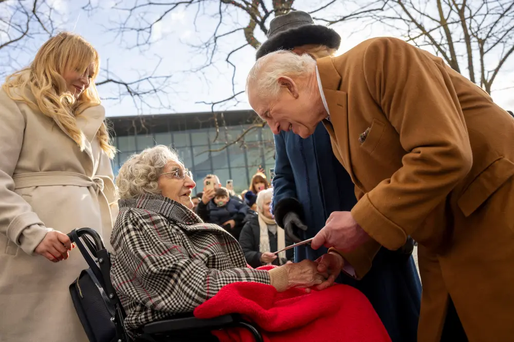 King Charles III and elderly woman