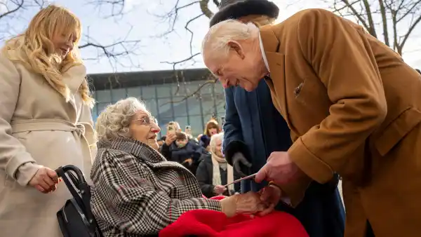King Charles III and elderly woman