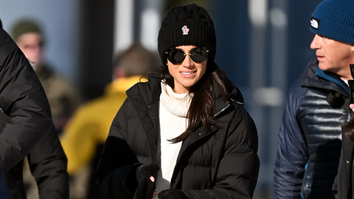 meghan markle in black puffer coat
