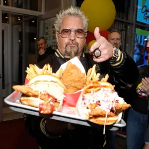 Guy Fieri Reveals What His Flavortown Catchphrase Actually Means