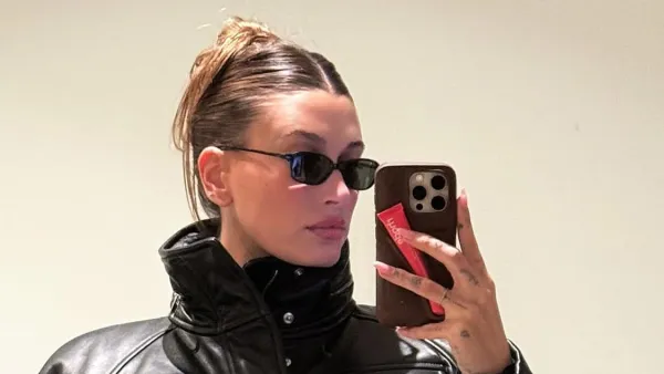 Hailey Bieber Wears Fit and Flare Leather Coat Dress on Date Night With Justin