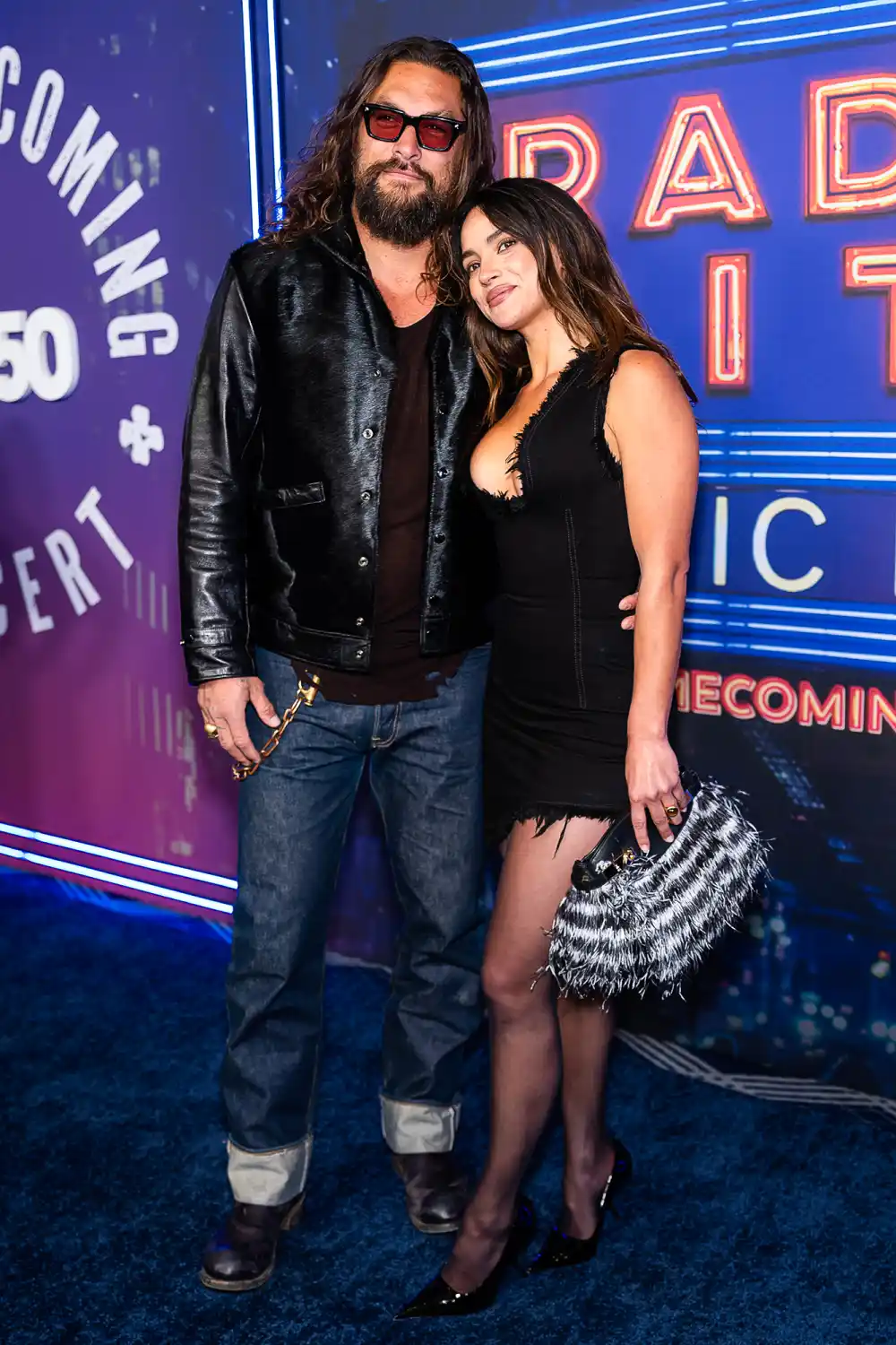 Jason Momoa and Girlfriend Adria Arjona Make Red Carpet Debut at 'SNL50' Replica Luxury Handbagcoming Concert