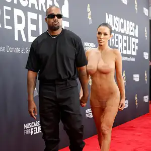 Kanye West Keeps It Casual at 2025 Grammy Awards While Wife Bianca Censori Poses in Sheer Dress