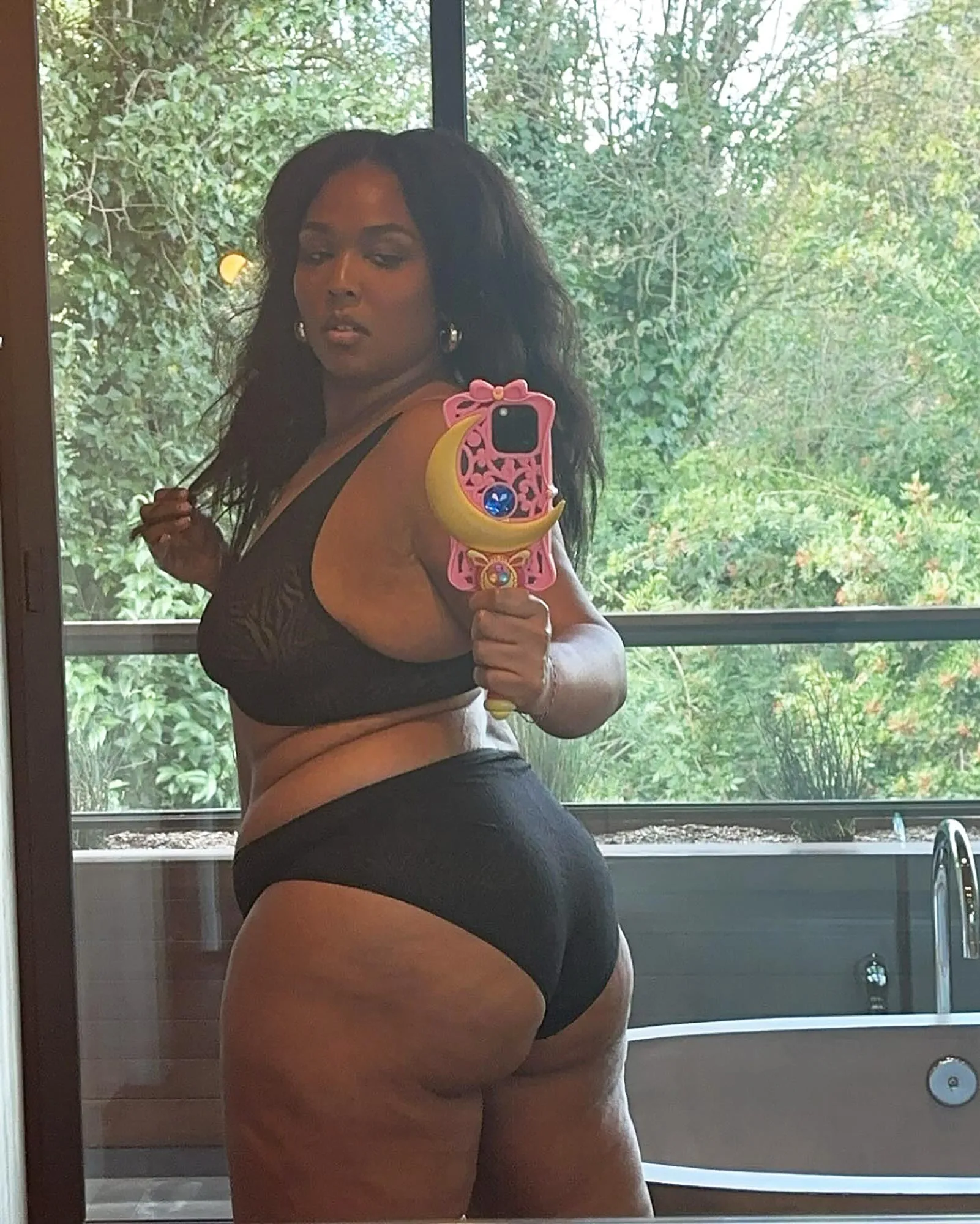 Lizzo Shows Off Her Figure in Yitty Lingerie