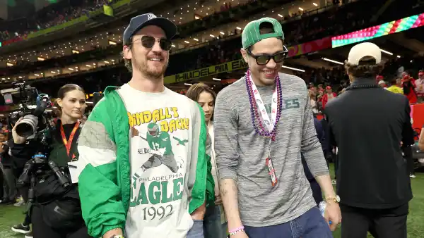 Pete Davidson Shows Off Ink-Free New Look Alongside Miles Teller at Super Bowl 2025