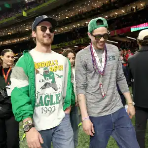 Pete Davidson Shows Off Ink-Free New Look Alongside Miles Teller at Super Bowl 2025