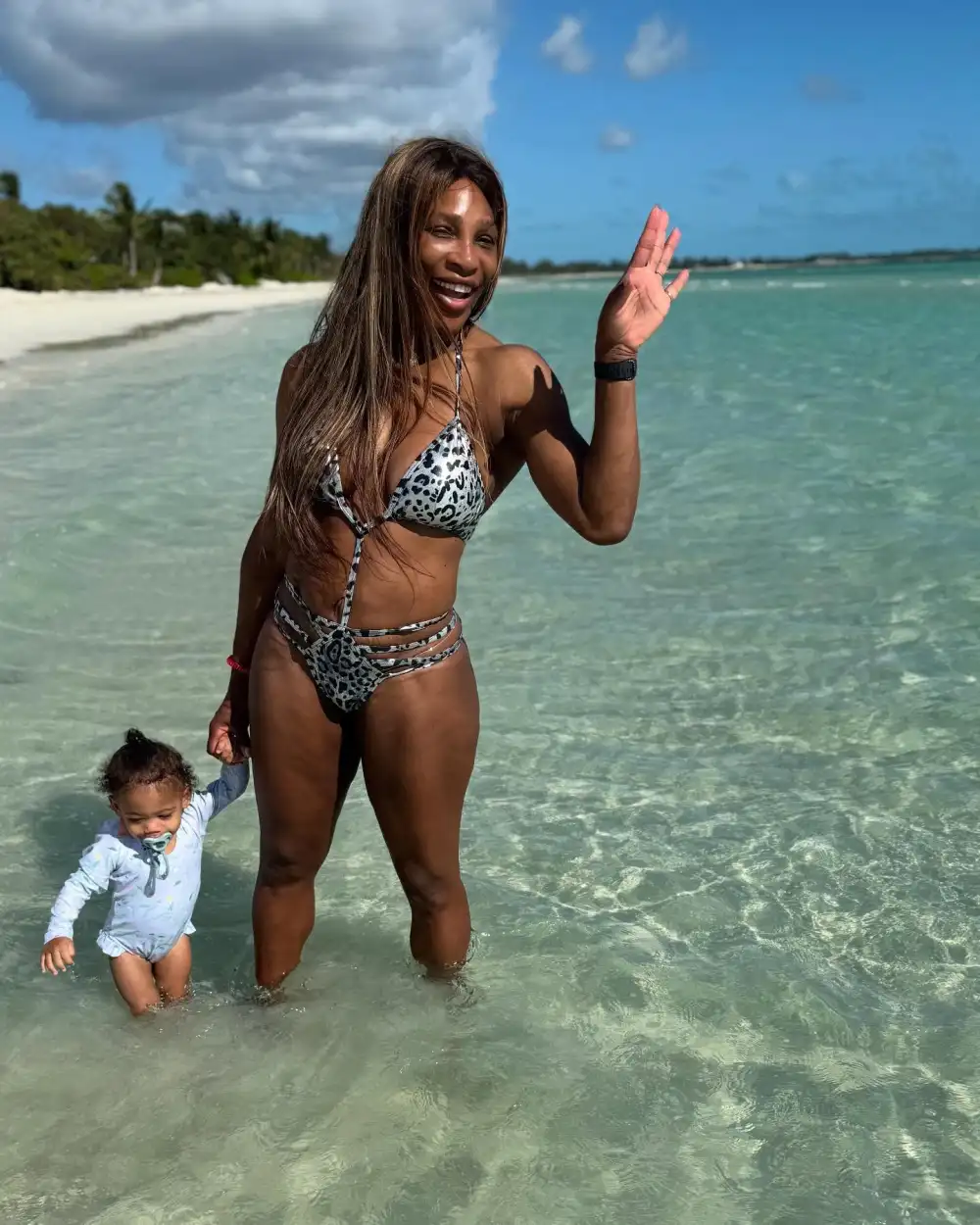 Serena Williams shows off her toned physique in leopard print bikini