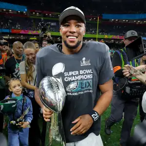 Shirtless Saquon Barkley Shotguns Beers in Locker Room After Super Bowl