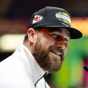 Travis Kelce Predicts Scott Swift Will Be Wearing Red Despite Eagles Fandom