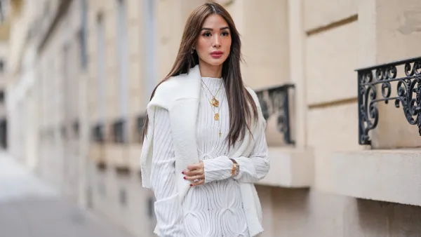 woman wearing white sweater dress