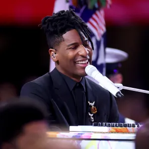 Jon Batiste Sings the National Anthem During 2025 Super Bowl
