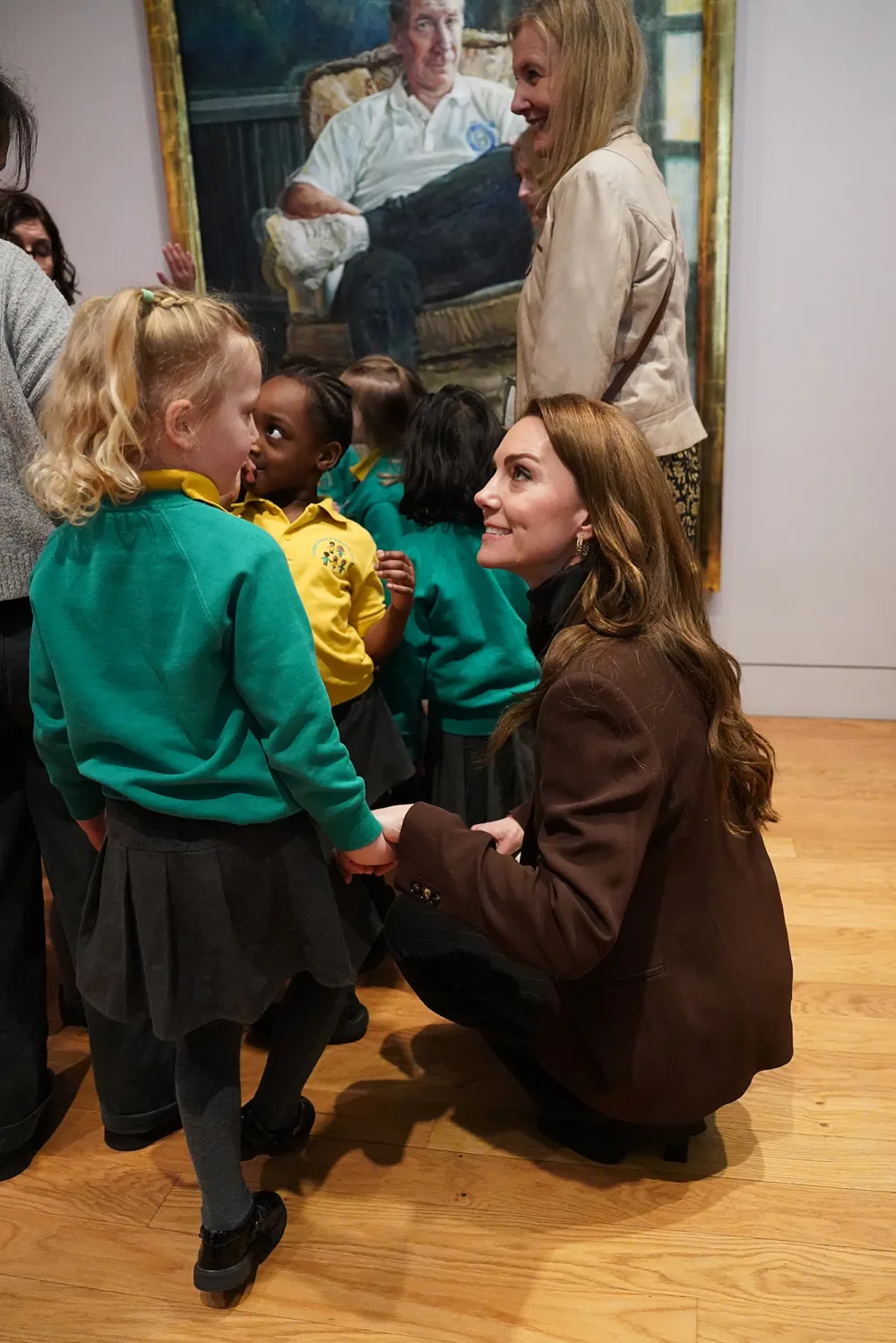 Kate Middleton Boards School Bus and Holds Hands With Children During Royal Visit