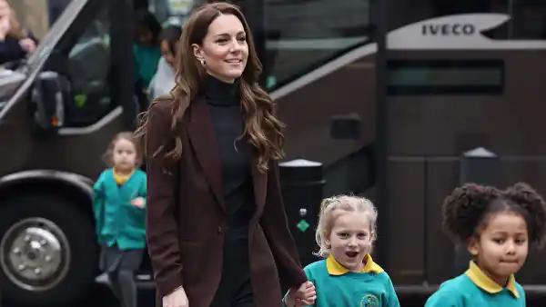 Kate Middleton Boards School Bus and Holds Hands With Children During Royal Visit