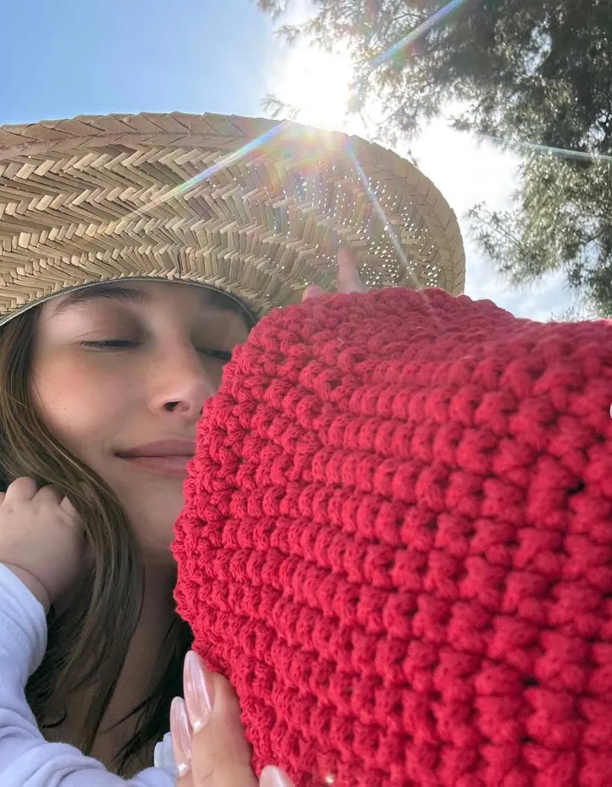 Hailey Bieber Cuddles Up to Son Jack Blues in New Photo