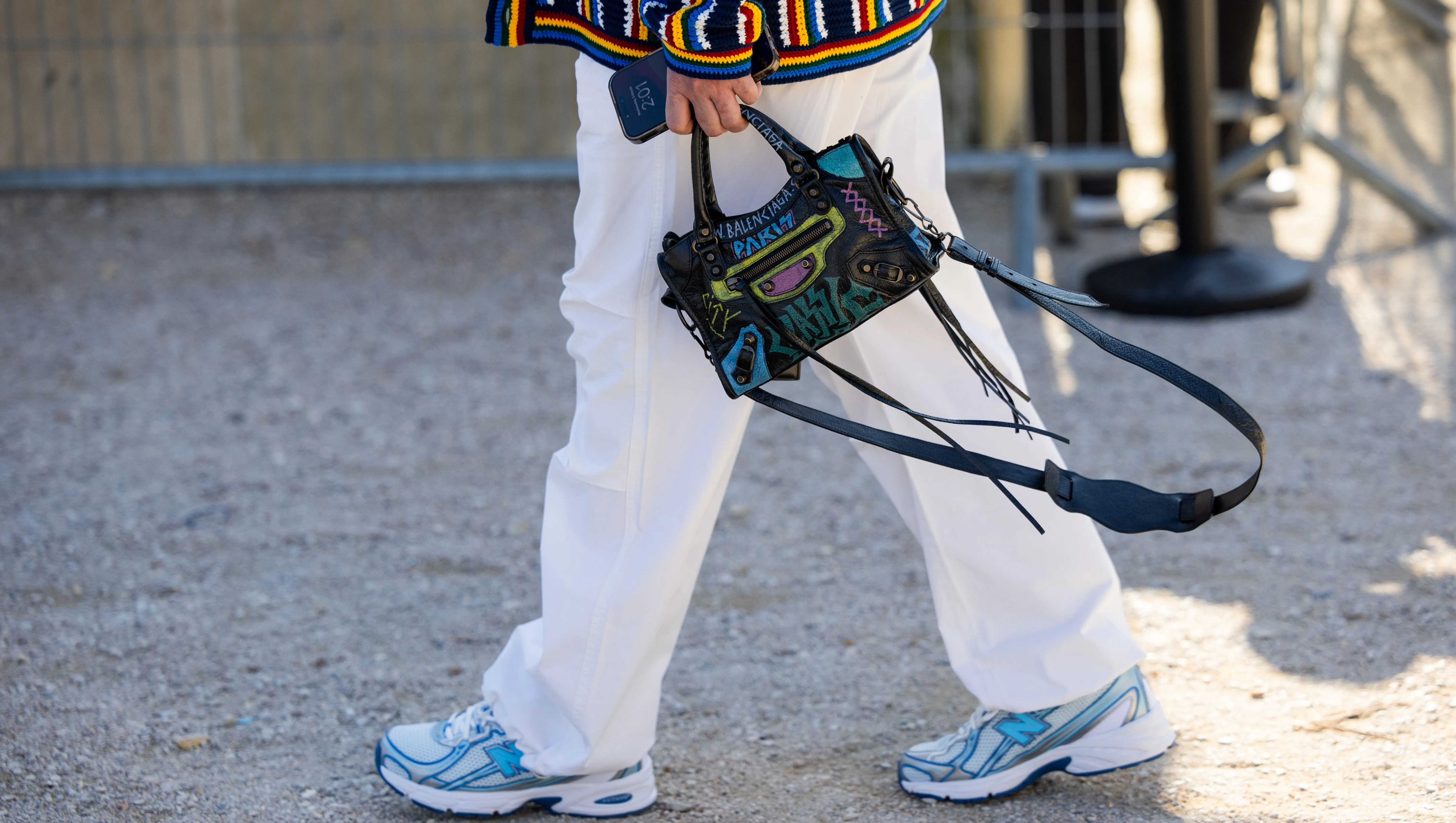 PARIS, FRANCE - MARCH 05: A guest wears Balenciaga bag outside Casablanca during the Womenswear Fall/Winter 2025/2026 as part of Paris Fashion Week on March 05, 2025 in Paris, France. (Photo by Christian Vierig/Getty Images)