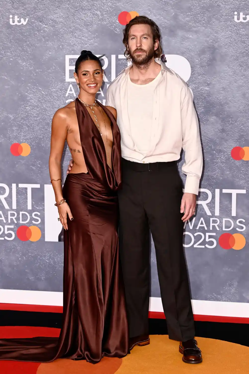 Calvin Harris Goes Scruffy at 2025 Brits With Wife Vick Hope