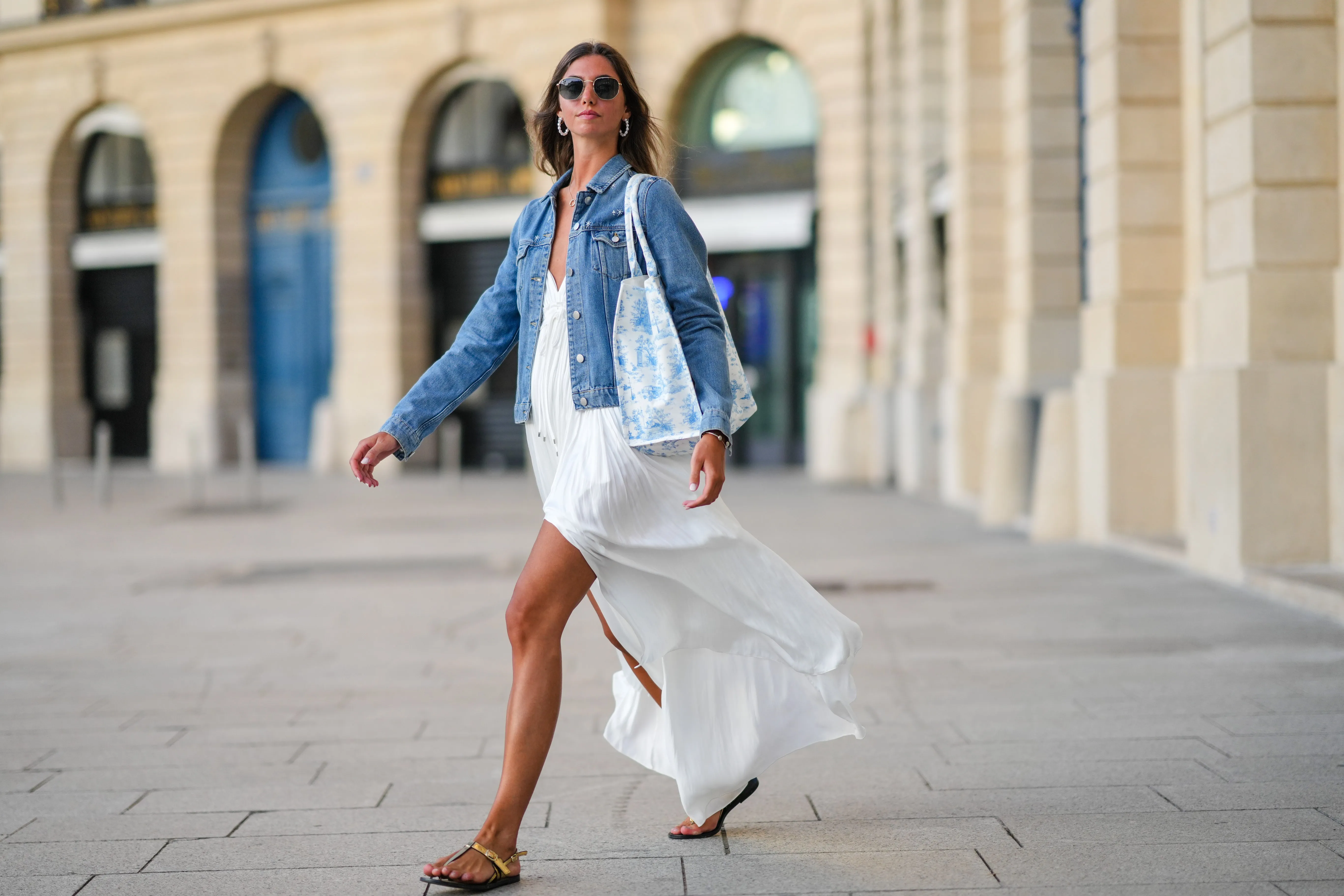 woman wearing white dress and denim jacket