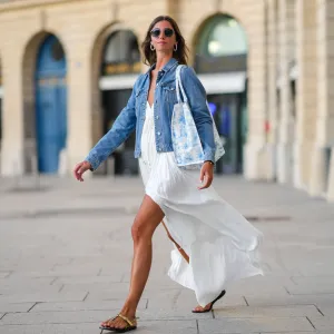 woman wearing white dress and denim jacket