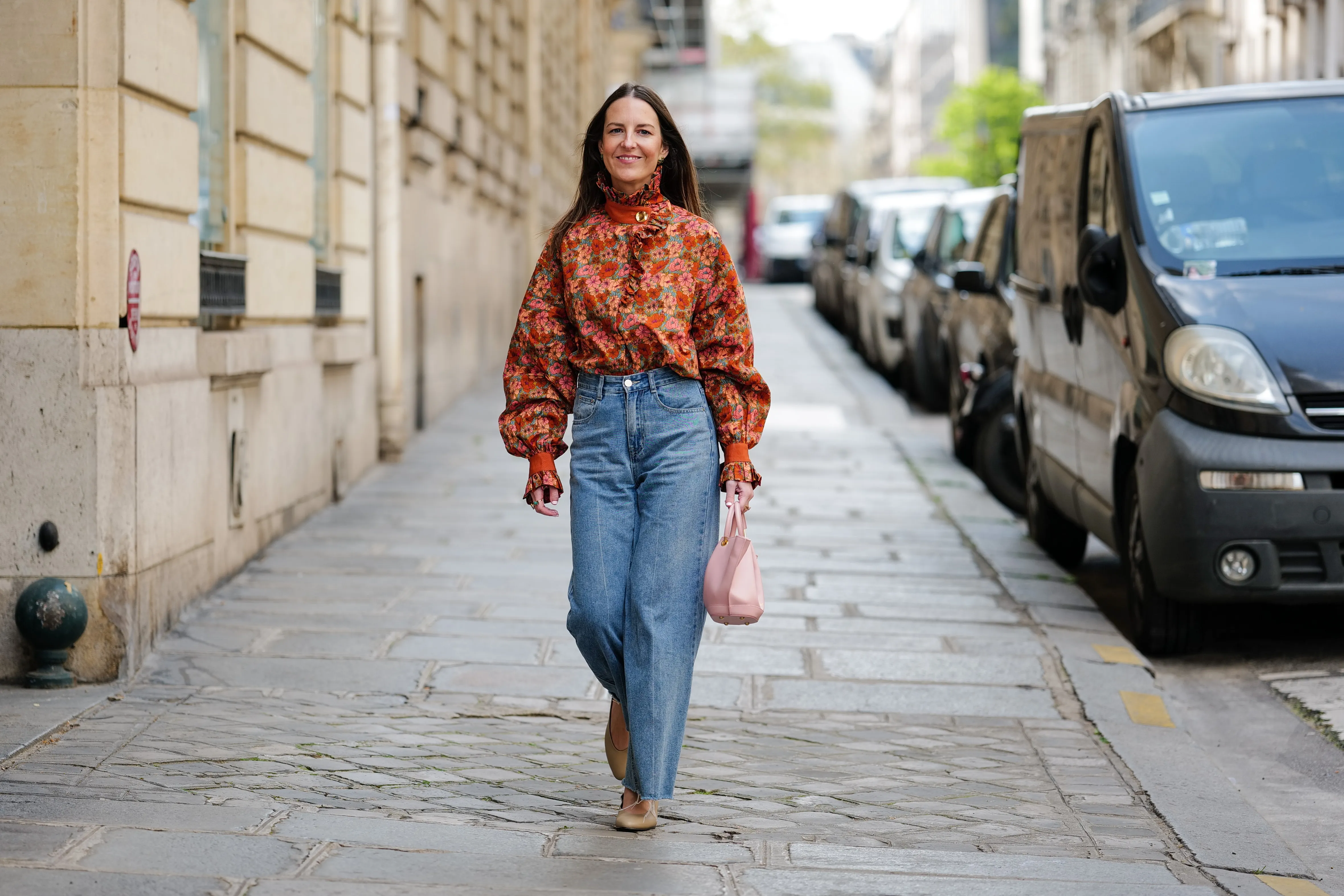 woman in jeans and floral top