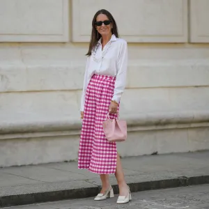 woman wearing white blouse and pink skirt