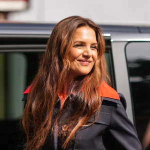 Katie Holmes wearing navy jacket