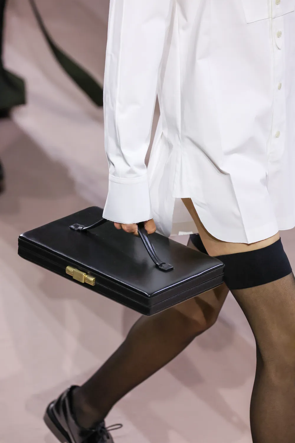 Victoria Beckham Brings Back One of Meghan Markle's Most Famous Bags - Fall 2025 bag on runway