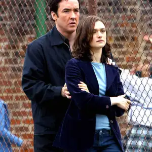 John Cusack and Rachel Weisz comfort each other in Runaway Jury.