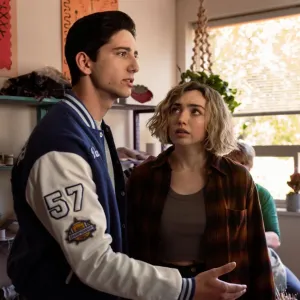Milo Manheim holds Peyton List in School Spirits.