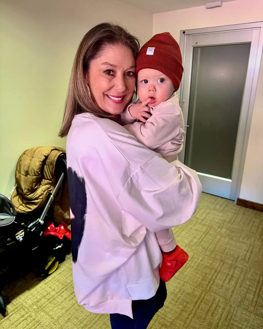 Randi Mahomes and baby Bronze