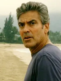 George Clooney looks back on a beach in The Descendants.