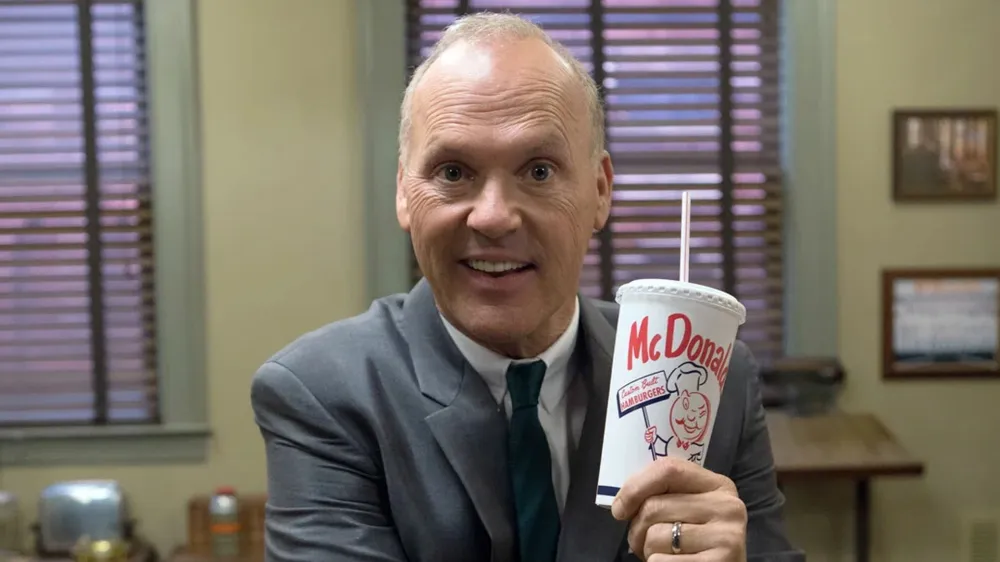 Michael Keaton holds a classic McDonald's cup in The Founder.