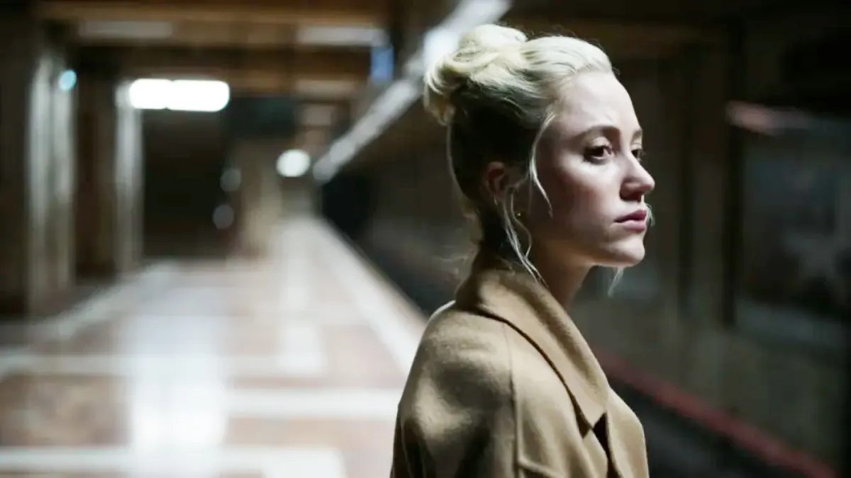 A woman waits for a subway in Watcher.