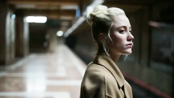 A woman waits for a subway in Watcher.