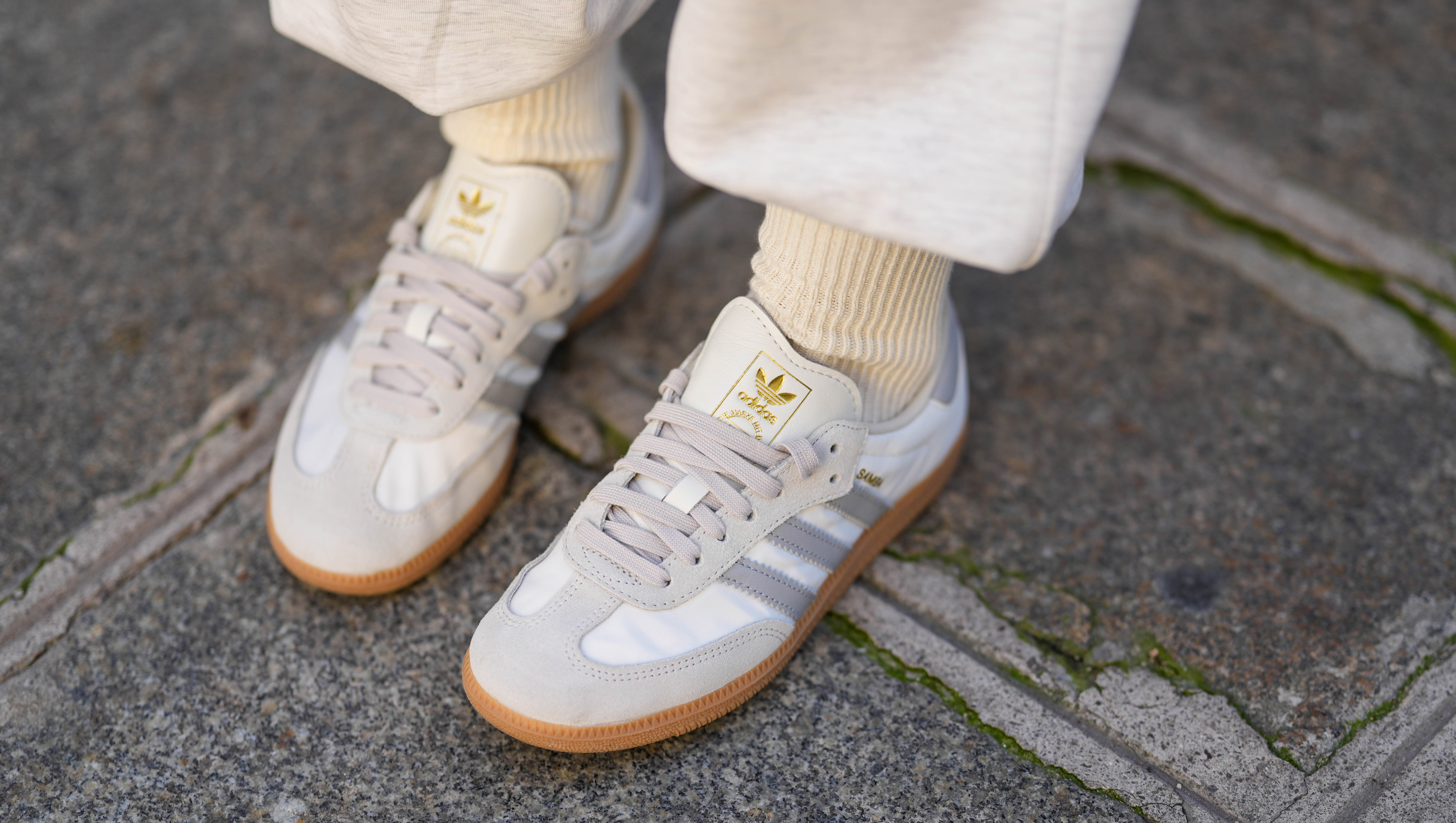 PARIS, FRANCE - OCTOBER 23: Diane Batoukina wears white socks, white Samba Adidas sneakers shoes, during a street style fashion photo session, on October 23, 2024 in Paris, France. (Photo by Edward Berthelot/Getty Images)